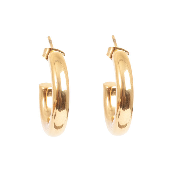 Gold hoop earrings on a white background