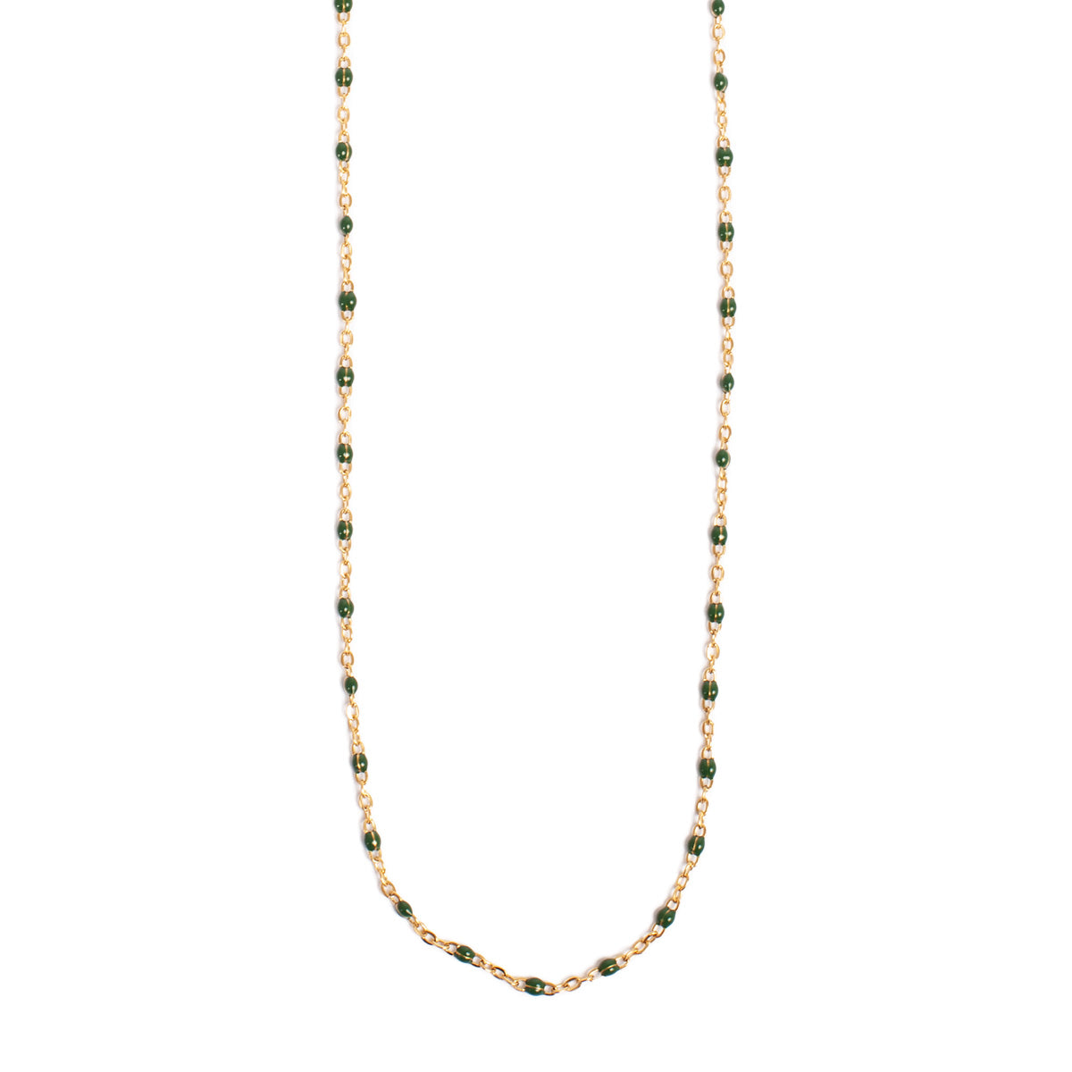 Necklace with green beads on a white background