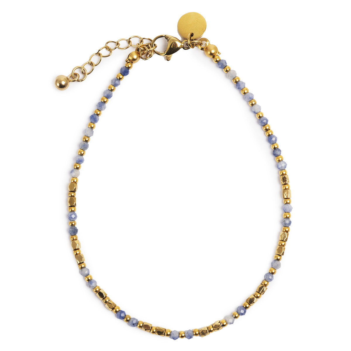 Gold and blue beaded bracelet on a white background