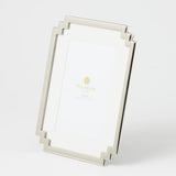 Shiny silver art deco style frame with white mat board to fit a 4 x 6 inch photo