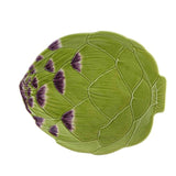 Green artichoke-shaped plate on a white background