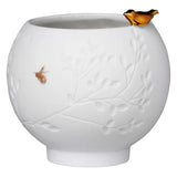 Little gold bird on white porcelain bowl suitable for tealight