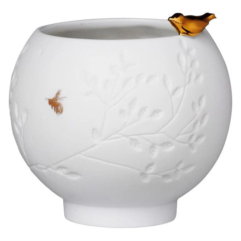 Little gold bird on white porcelain bowl suitable for tealight