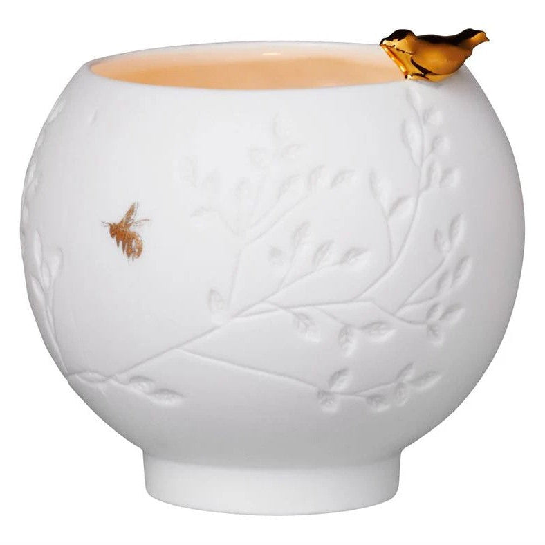 Little gold bird on white porcelain bowl suitable for tealight
