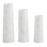Set of 3 Mini Poetry Vases are handmade from embossed porcelain.  These little vases are pure and elegant,  glazed inside and unglazed outside.   Therefore they will hold water and blooms. Each vase is stamped with the names of flowers.  Three sizes in the set: 95mm high ∙ 80mm high ∙ 65mm high. Diameter 25 – 30mm  Gift Boxed set of 3.