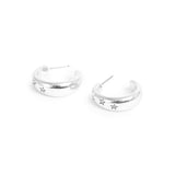 Silver hoop earrings with star designs on a white background