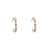 Pair of gold hoop earrings with colorful gemstones on a white background