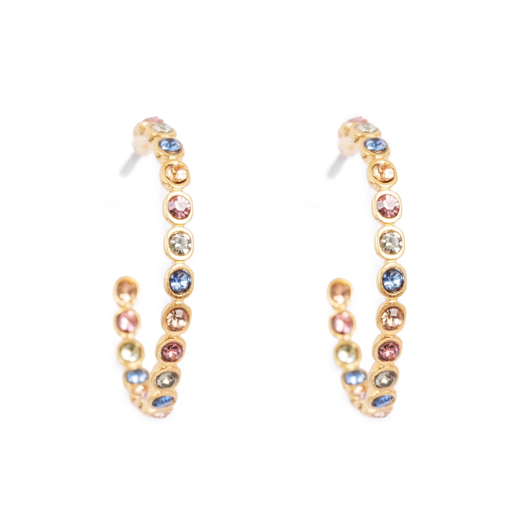 Gold hoop earrings with multicolored gemstones on a white background