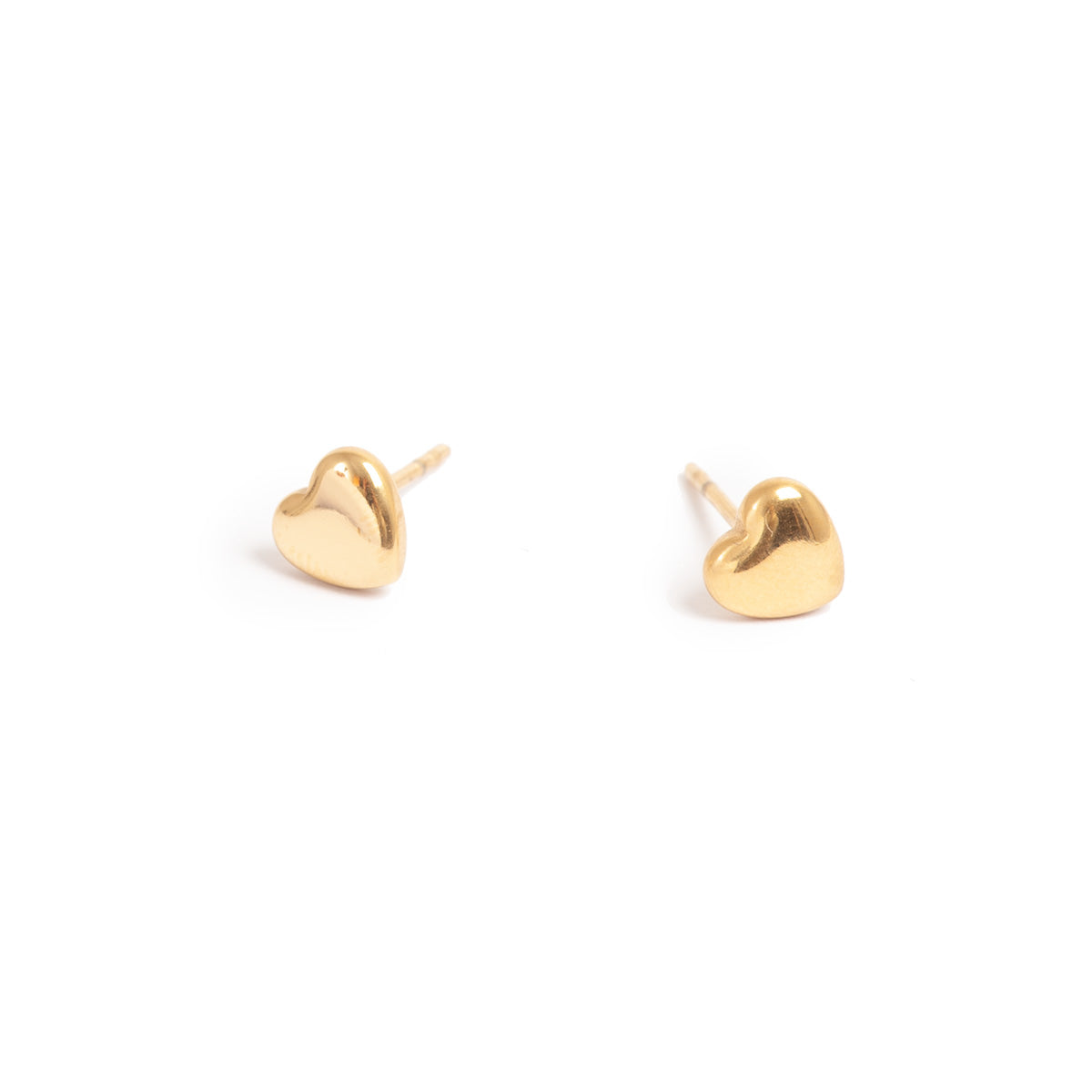 Gold heart-shaped stud earrings on a white background