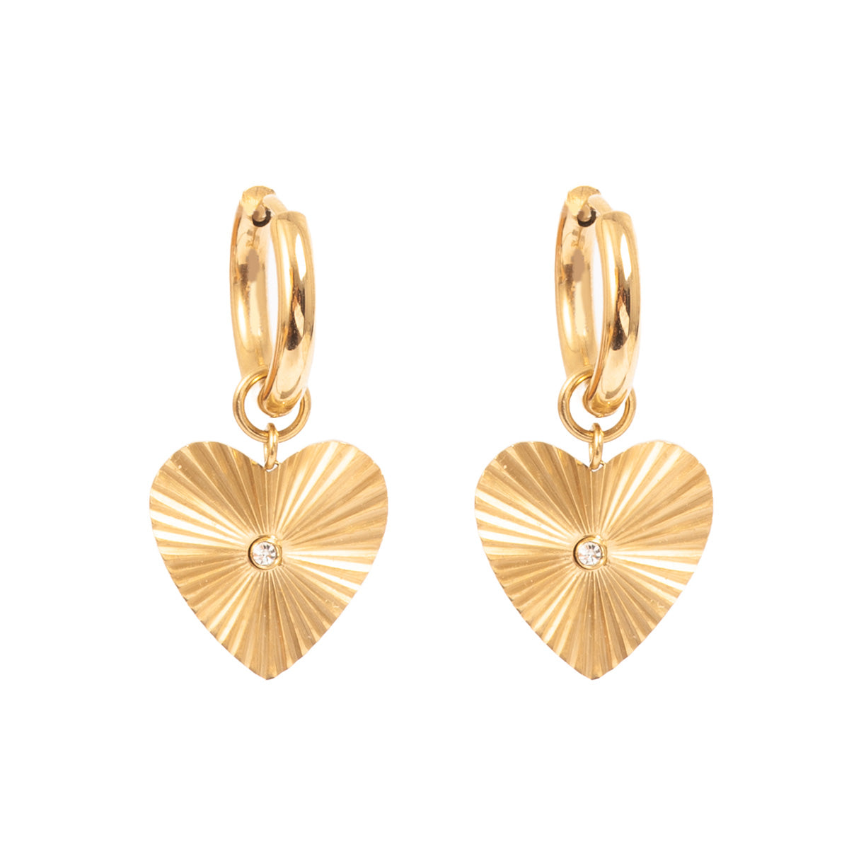 Gold heart-shaped earrings with a white background