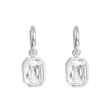 Pair of silver earrings with clear crystals on a white background