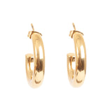 Gold hoop earrings on a white background