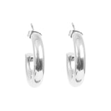 Pair of silver hoop earrings on a white background
