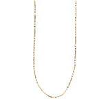 Necklace with small beads on a white background
