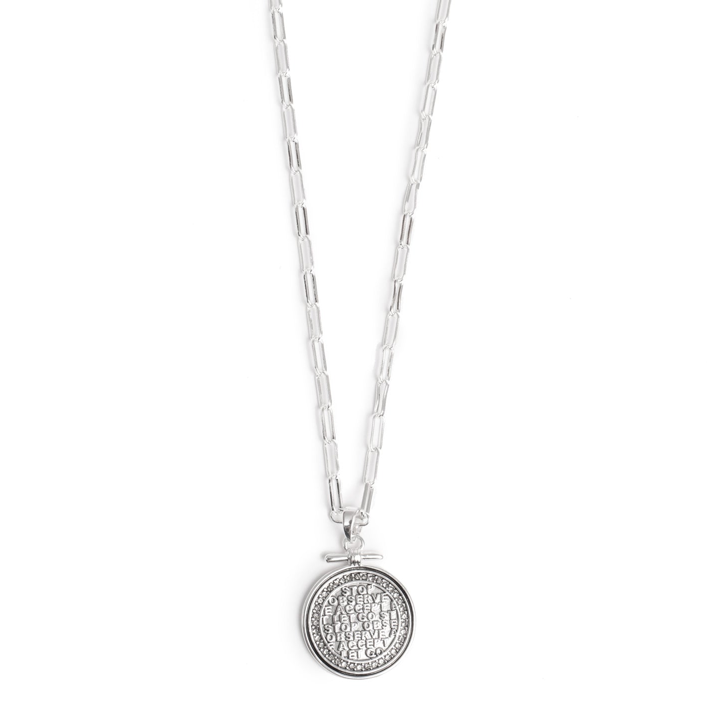 Silver pendant disc with script and crystals