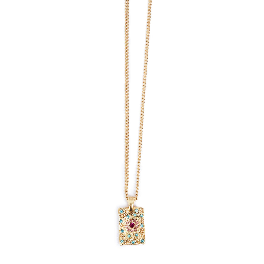 Gold necklace with a rectangular pendant featuring colorful crystals on a white background
