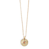 Gold necklace with a round pendant featuring coloured crysals on a white background