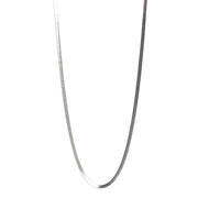 Silver chain necklace on a white background