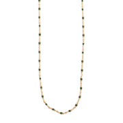 Necklace with green beads on a white background
