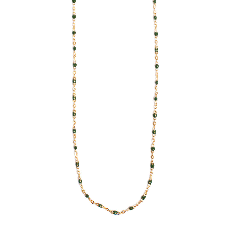 Necklace with green beads on a white background