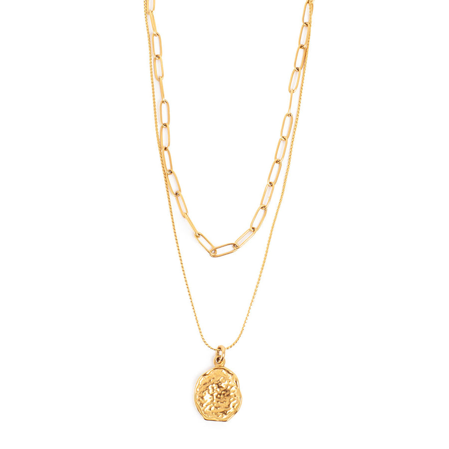 Gold necklace with 2 chains, the longer chain has a gold pendant on it, the shorter chain is a slightly chukier gold link