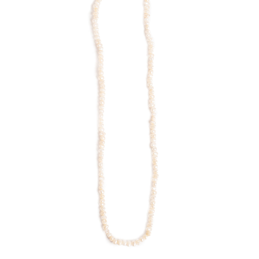 Short pearl necklace on a white background