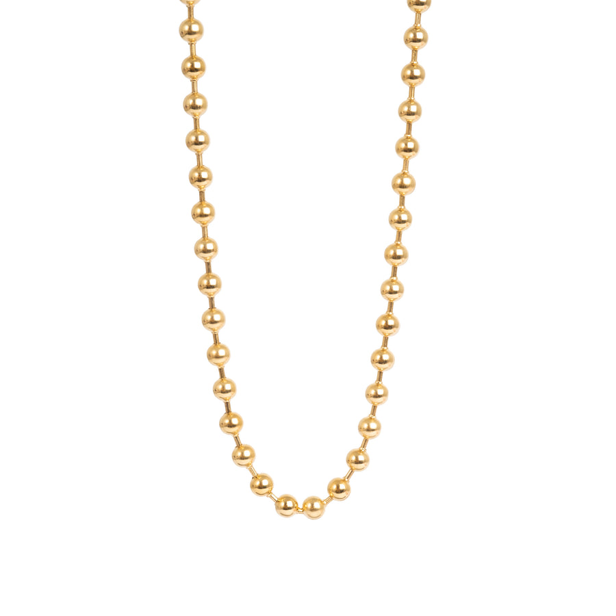 Gold bead necklace on a white background