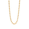 Gold bead necklace on a white background