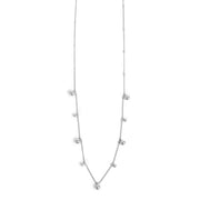 Silver necklace with small beads on a white background