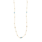 Necklace with small blue beads on a white background