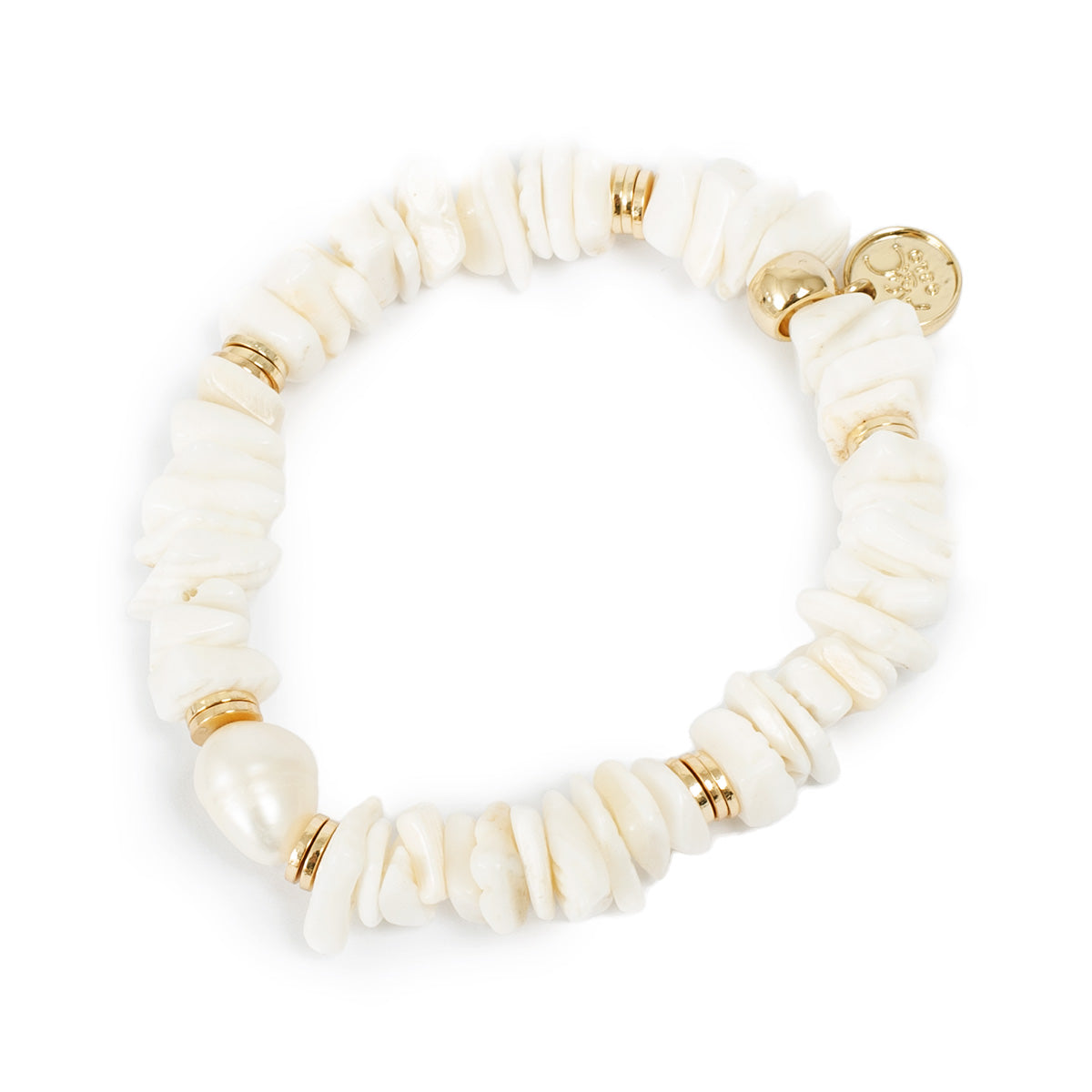 White shell and pearl bracelet with gold accents on a white background