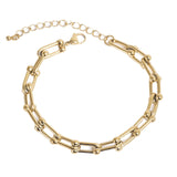 Gold chain bracelet on a white background