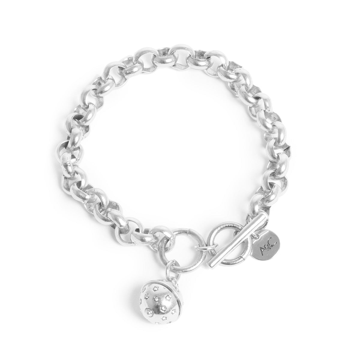 Silver chain bracelet with a toggle clasp and round charm on a white background