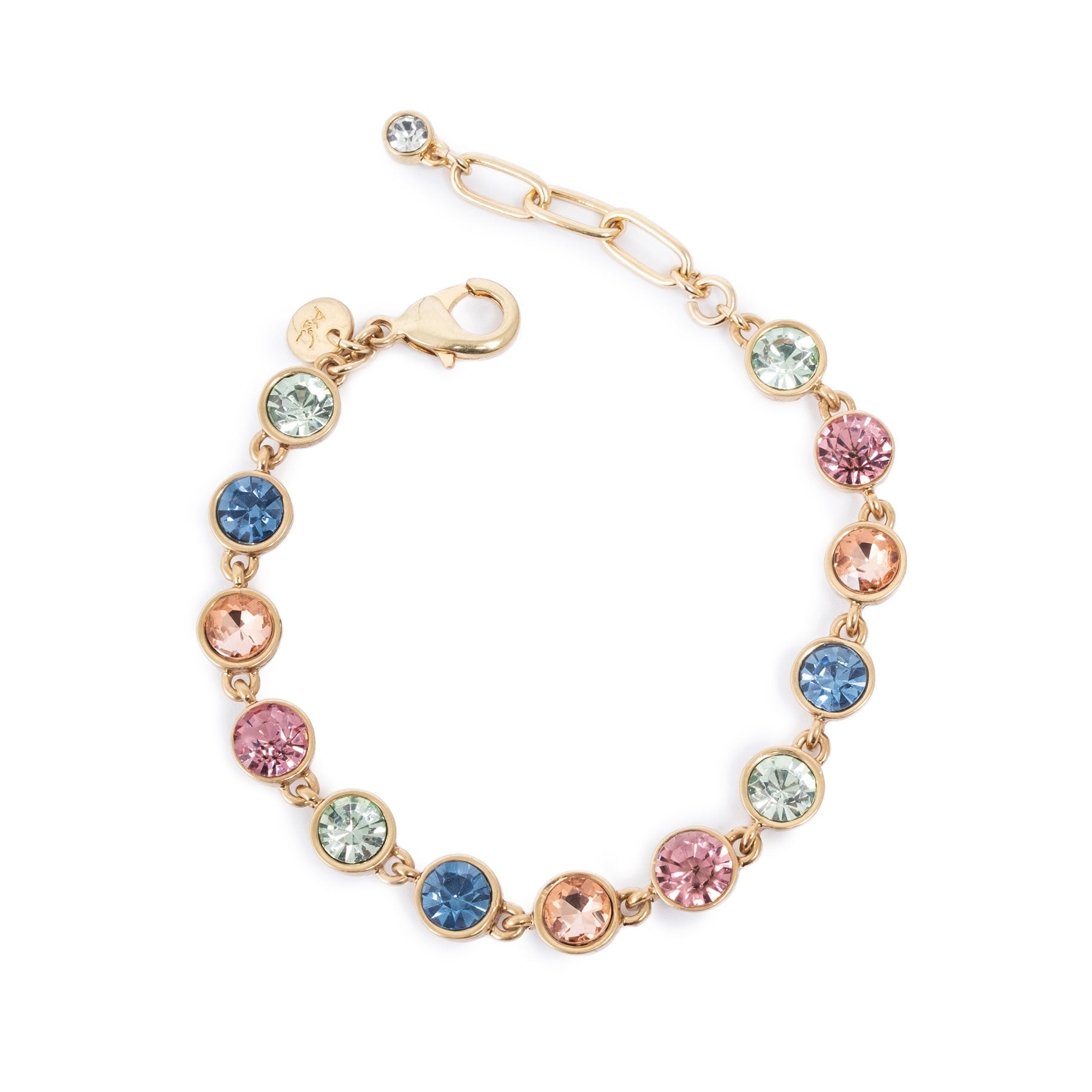 Gold bracelet with multicolored crystals on a white background
