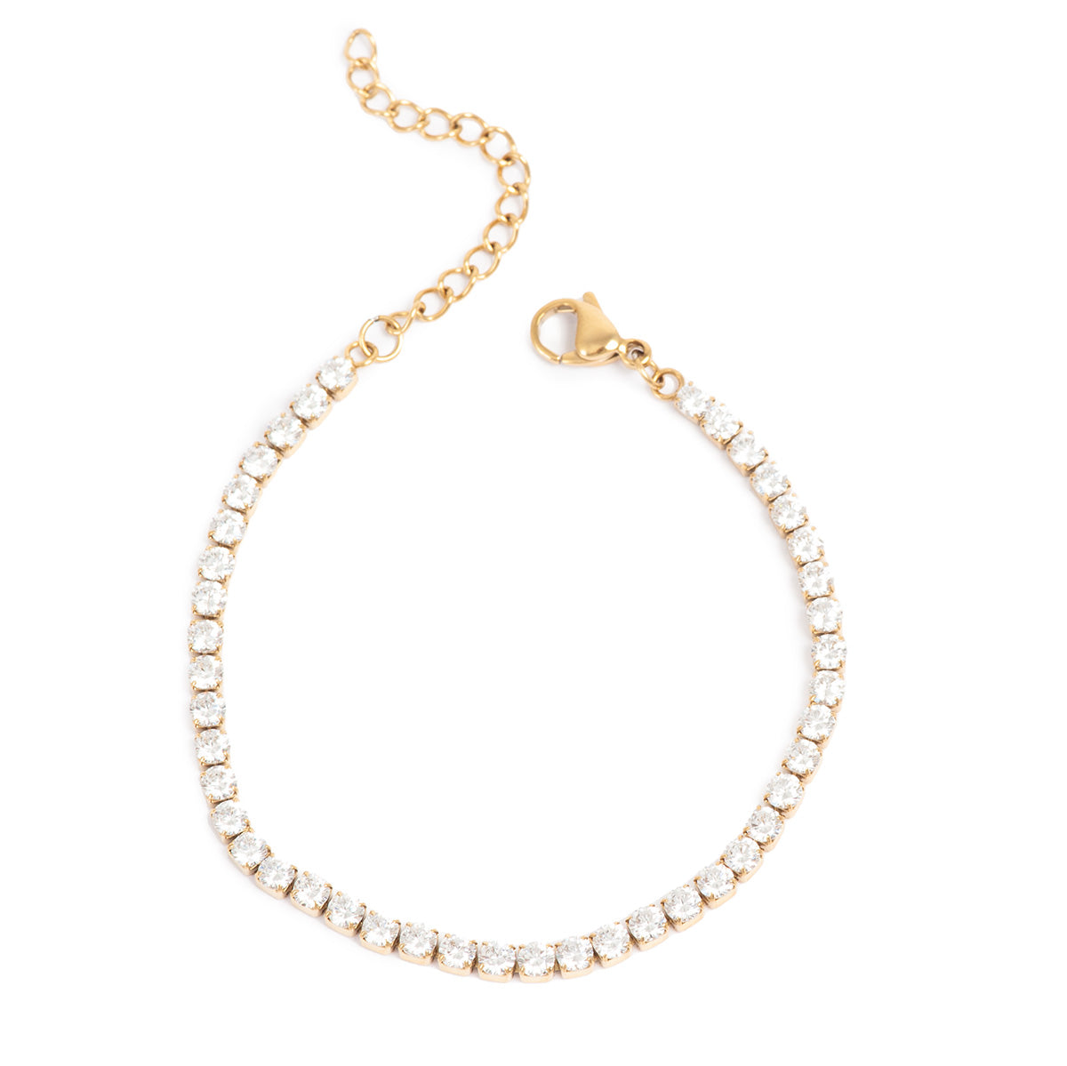 Gold bracelet with crystals on a white background