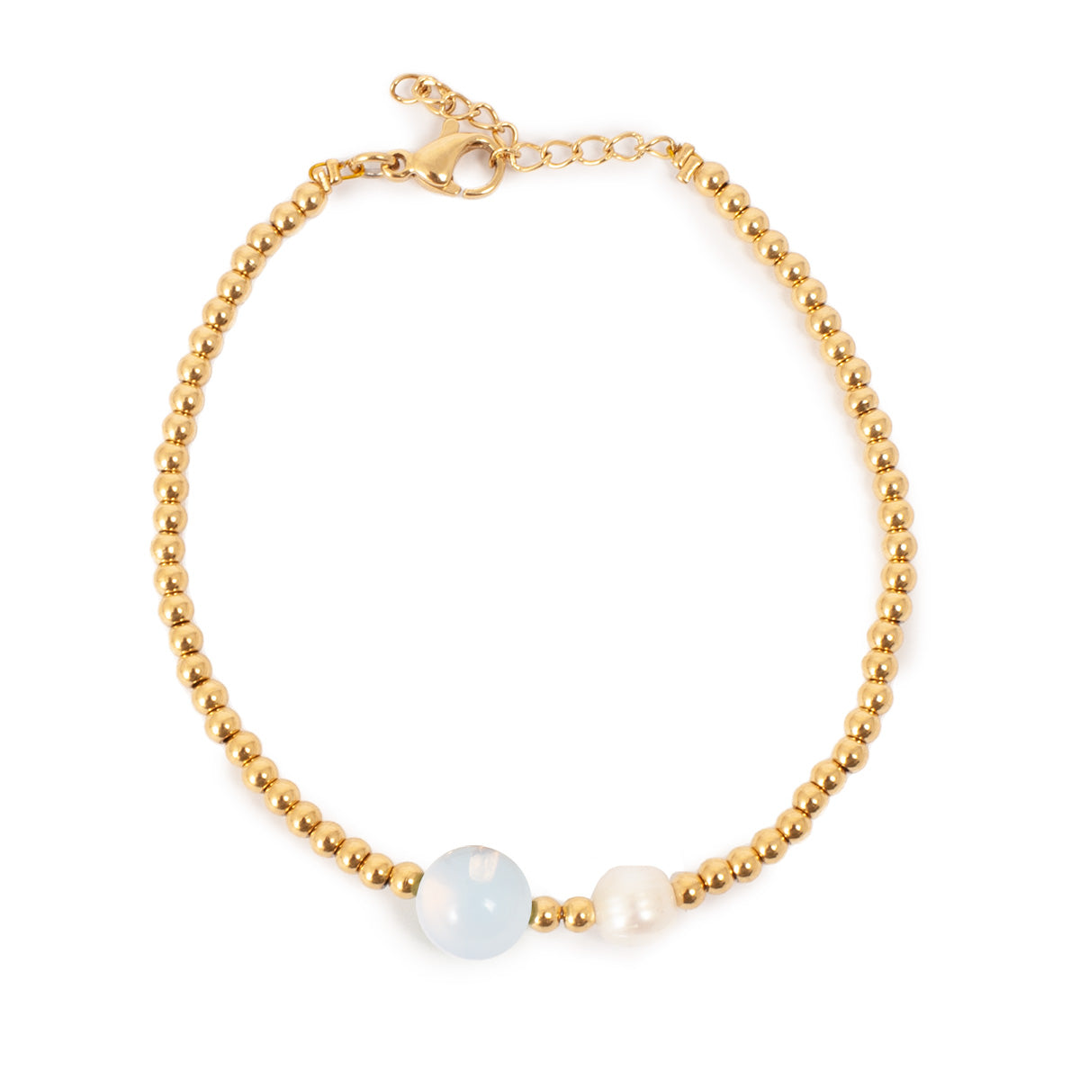 Gold beaded bracelet with pearls on a white background
