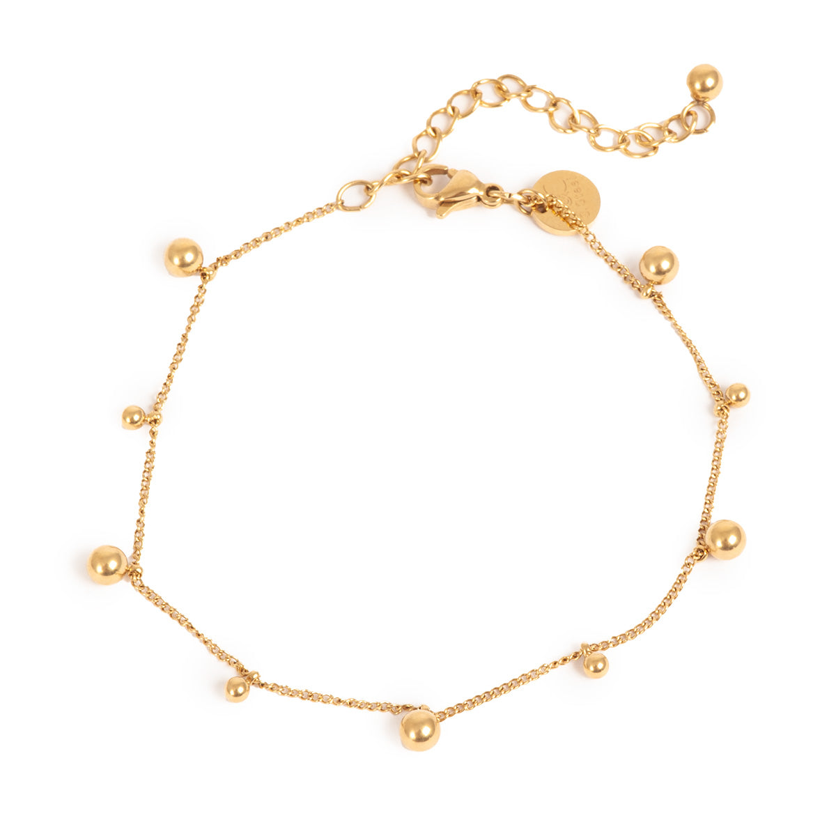 Gold bracelet with small round beads on a white background
