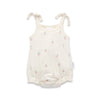 White baby romper with a cherry print and tie shoulders