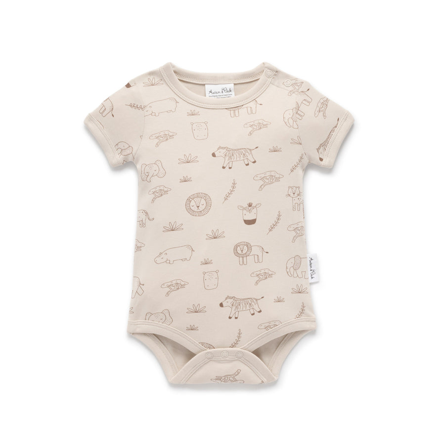 Beige baby bodysuit with animal prints on a white background