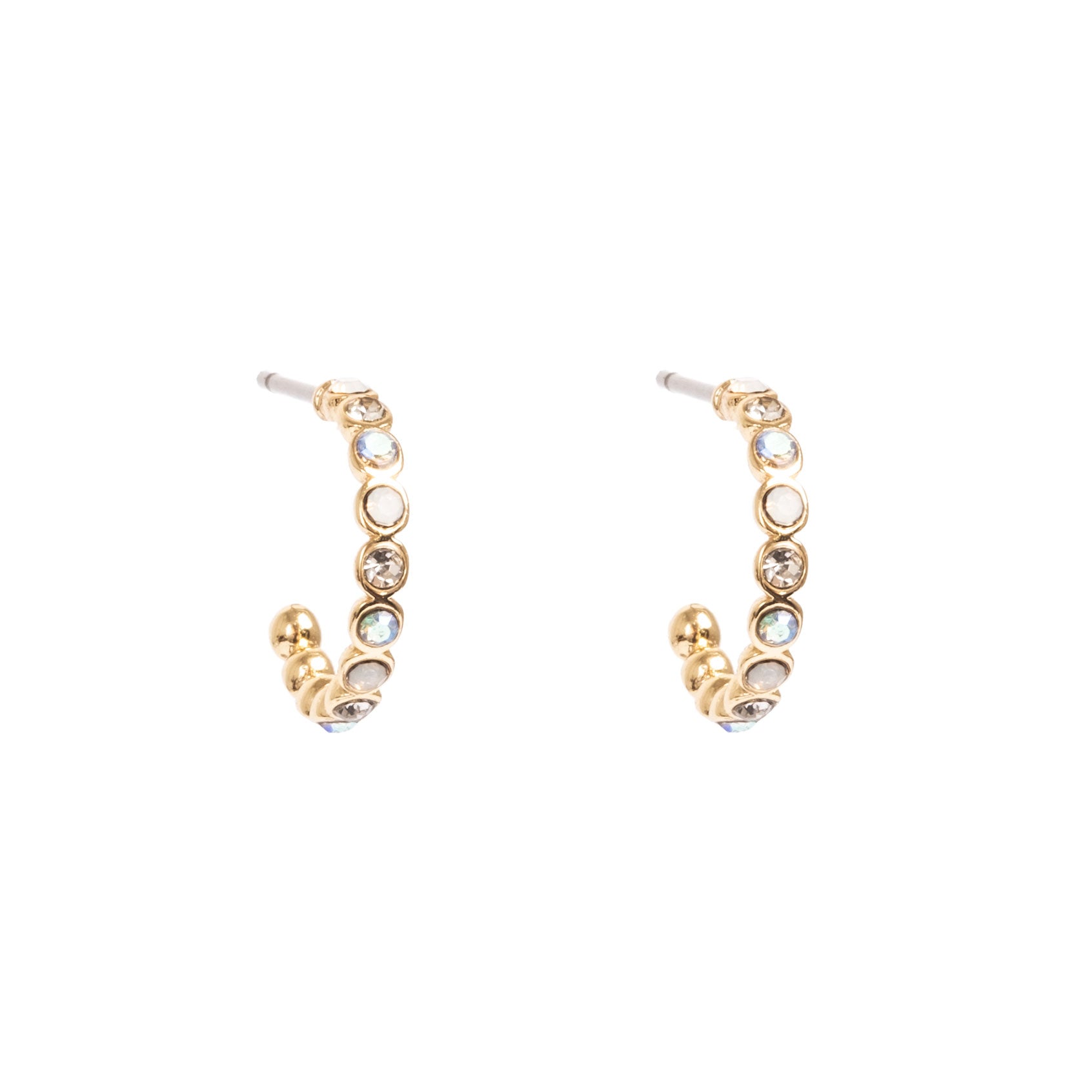 These stunning Solstice Gold Creole Earrings from the new season A&C  Oslo Shimmer collection will take you to from day to night with ease.
The Shimmer Collection features white opal stones, crystals and bohemian details to bring out the beauty in the natural and imperfect. These pieces are great to match with feminine and bohemian fashion trends and are 14K Gold plated at Cerise.

Measures 11mm.