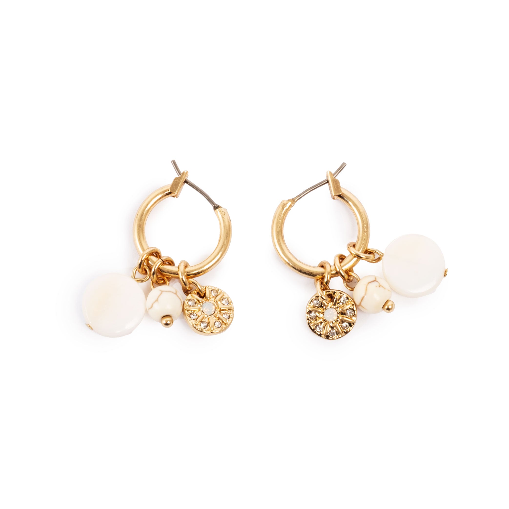 A&C Oslo Shimmer Collection, featuring the Solstice Gold Bunch Earrings. Beautifully feminine with just a little bit of Boho on the side. 
The Shimmer Collection features white opal stones and bohemian details to bring out the beauty in the natural and imperfect. These pieces are great to match with feminine and bohemian fashion trends and are 14K gold plated steel.
Measurements: 16mm hoop