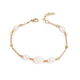 Beautiful bracelet from A&C Oslo  made from steel and plated in 14K gold.  Features fresh water pearls linked with gold plated beads.  Measures 17cm and haws a 3cm extension chain at Cerise NZ.