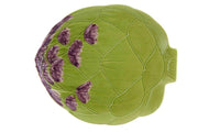 Green ceramic artichoke-shaped dish with purple floral patterns on a white background