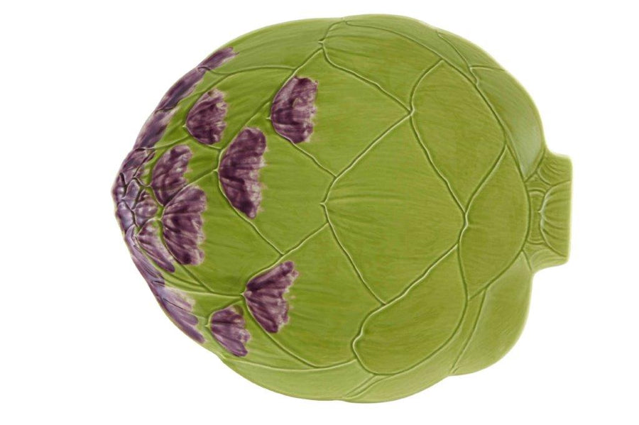 Green ceramic artichoke-shaped dish with purple floral patterns on a white background