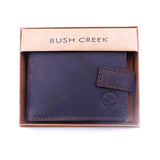 Brown leather wallet with visible brand 'Bush Creek' on a white background