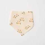 Over the Dandelions Organic Cotton Muslin Dribble Bib  for baby at Cerise in Daisy print. A great newborn baby gift idea.