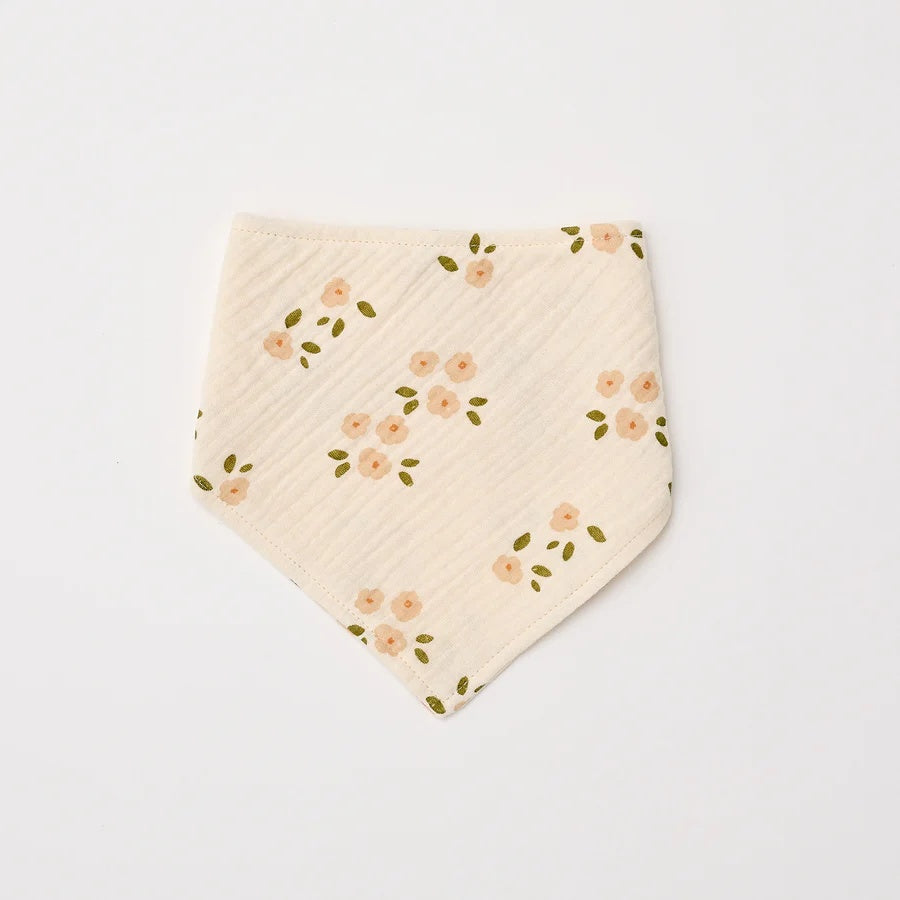 Over the Dandelions Organic Cotton Muslin Dribble Bib  for baby at Cerise in Daisy print. A great newborn baby gift idea.