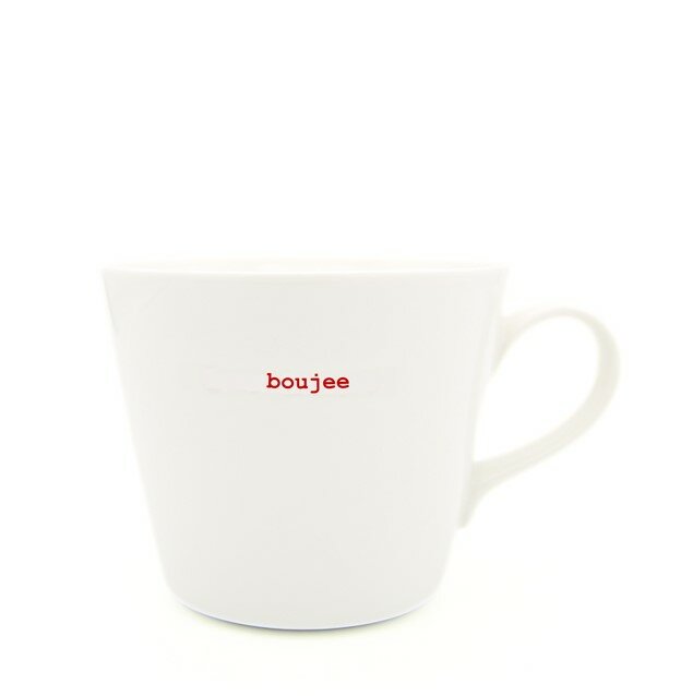 White mug with 'boujee' text in red on a white background