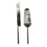 Cake server set including a cake knife and a cake server.  Stainless steel with burnished black forged handles. Comes gift boxed at Cerise