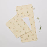 Over the Dandelions Set of 2 Burp cloths in Daisy Print at Cerise. Made from soft muslin and terry cotton so they are super soft of bbys skin.  These burp cloths are a great neborn baby gift.